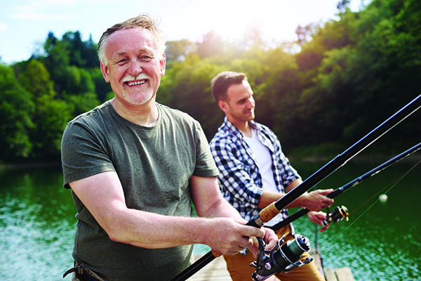 Two men fishing.